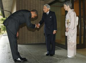 U.S. President Barack Obama is greeted by Japanese Emperor Akihito and Empress Michiko upon arrival at the Imperial Palace in Tokyo