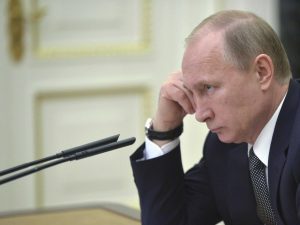 Vladimir Putin at the Kremlin, in a meeting on March 4, 2015, one of the last times he was seen recently (photo credit: Reuters)