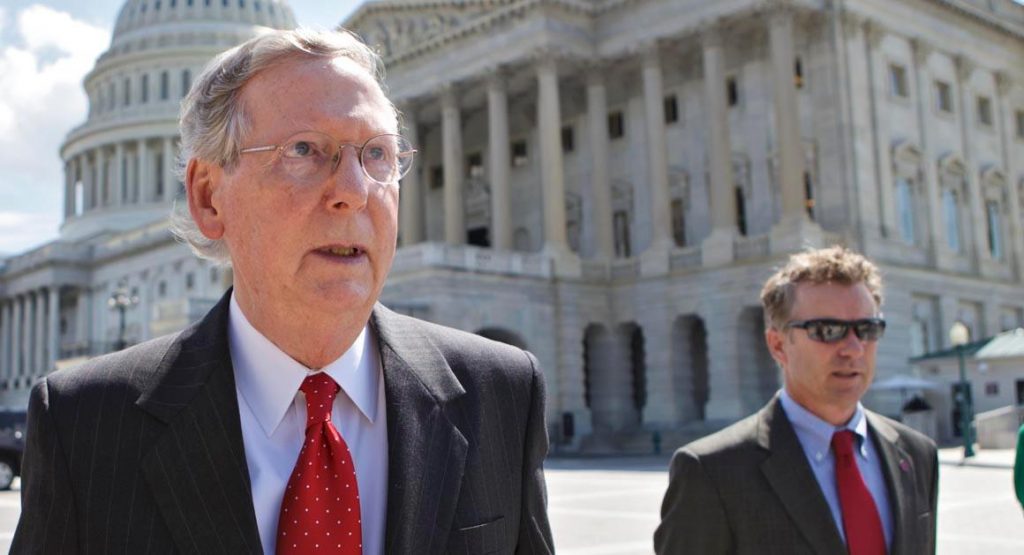 Senate Minority Leader Mitch McConnell and Sen. Rand Paul, pictured together in 2013  (AP Photo/J. Scott Applewhite)