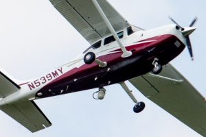 PHOTO TAKEN MAY 26, 2015 In this photo taken May 26, 2015, a small plane flies near Manassas Regional Airport in Manassas, Va. The plane is among a fleet of surveillance aircraft by the FBI, which are primarily used to target suspects under federal investigation. Such planes are capable of taking video of the ground, and some _ in rare occasions _ can sweep up certain identifying cellphone data. (AP Photo/Andrew Harnik)