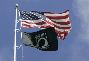 U.S. Flag and POW/MIA flag from article