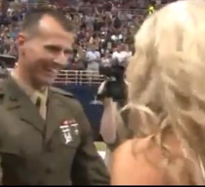 Marine cheerleader gets surprise from Marine husband