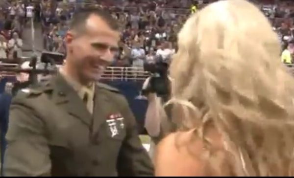 Marine cheerleader gets surprise from Marine husband