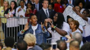 Protestors chanting "Black Lives Matter" at Clinton rally