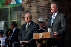 NEW YORK, NY - NOVEMBER 16: New York City Mayor Bill de Blasio (right) announces the formation of the NYPD Critical Command of the Counter-Terrorism Bureau, while New York City Police Commissioner William Bratton (left) listens, on Randall's Island November 16, 2015 in New York City. Following the announcement was the first deployment of the NYPDÕs new Critical Response Command of the Counter-Terrorism Bureau trained to respond to terrorist threats like the most recent attack in Paris. (Photo by Bryan Thomas/Getty Images)