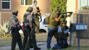 Police officers conduct a manhunt after a mass shooting in San Bernardino, California December 2, 2015. Gunmen opened fire on a holiday party on Wednesday at a social services agency in San Bernardino, California.