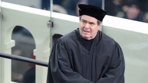 Justice Antonin Scalia wearing a replica of the toque worn by martyr Thomas More