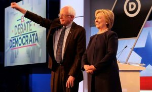 Democratic presidential candidates Hillary Clinton (R) and Bernie Sanders participate in the democratic debate at Miami Dade College in Miami on March 9, 2016.  / AFP / Gaston De Cardenas        (Photo credit should read GASTON DE CARDENAS/AFP/Getty Images)