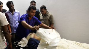 The body of Bangladeshi publisher Faisal Arefin Dipan, lies in a morgue after he was killed in an attack in his office. AFP PHOTO / MUNIR UZ ZAMAN