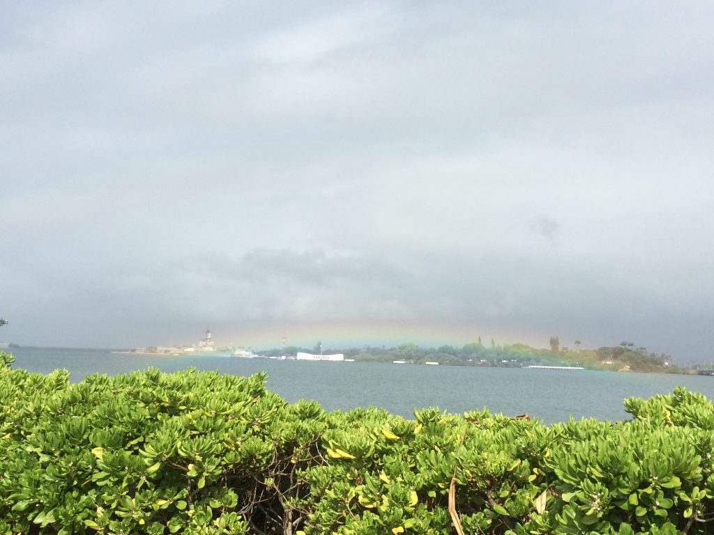 The USS Missouri and the USS Arizona Memorial, covered by a rainbow, July 3, 2016