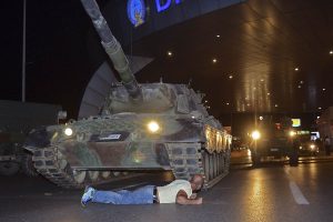 Civilian Lays In Front Of Tank