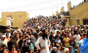 Hundreds of onlookers, including children, attended the spectacle in the town square