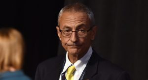 John Podesta, Chairman of the 2016 Hillary Clinton presidential campaign, looks on before the first vice presidential debate at Longwood University in Farmville, Virginia on October 4, 2016. / AFP / Paul J. Richards (Photo credit should read PAUL J. RICHARDS/AFP/Getty Images)