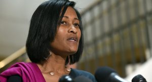 Former Hillary Rodham Clinton aide Cheryl Mills speaks to reporters on Capitol Hill in Washington, Thursday, Sept. 3, 2015, following her deposition before the panel investigating Benghazi. The committee was launched last year to investigate the Obama administration's response to the Benghazi attacks that killed four Americans, including the U.S. ambassador. The investigation has widened in recent months to focus on Clinton's use of a private email account and server. (AP Photo/Susan Walsh)