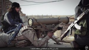 An ISIS fighter in Tal Kayf prior to the villages liberation