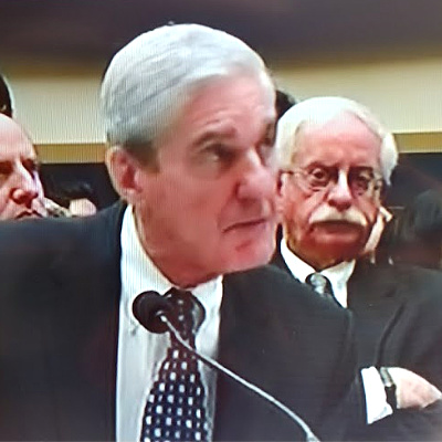 Robert Mueller listens during the Mueller Hearings