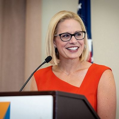 Sinema Leaves Protesters Out In The Cold, Skips Race