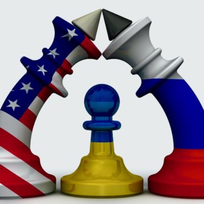 Macron Brokers Conditional U.S. Russia Summit Over Ukraine