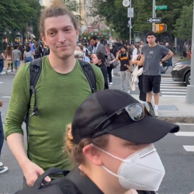 Immigration Protestor Mocks Woman On Her Way To Work